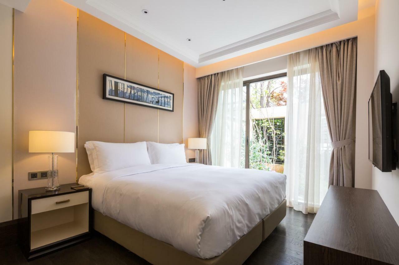 ליג'יאנג Howard Johnson Jinlin Plaza Lijiang מראה חיצוני תמונה