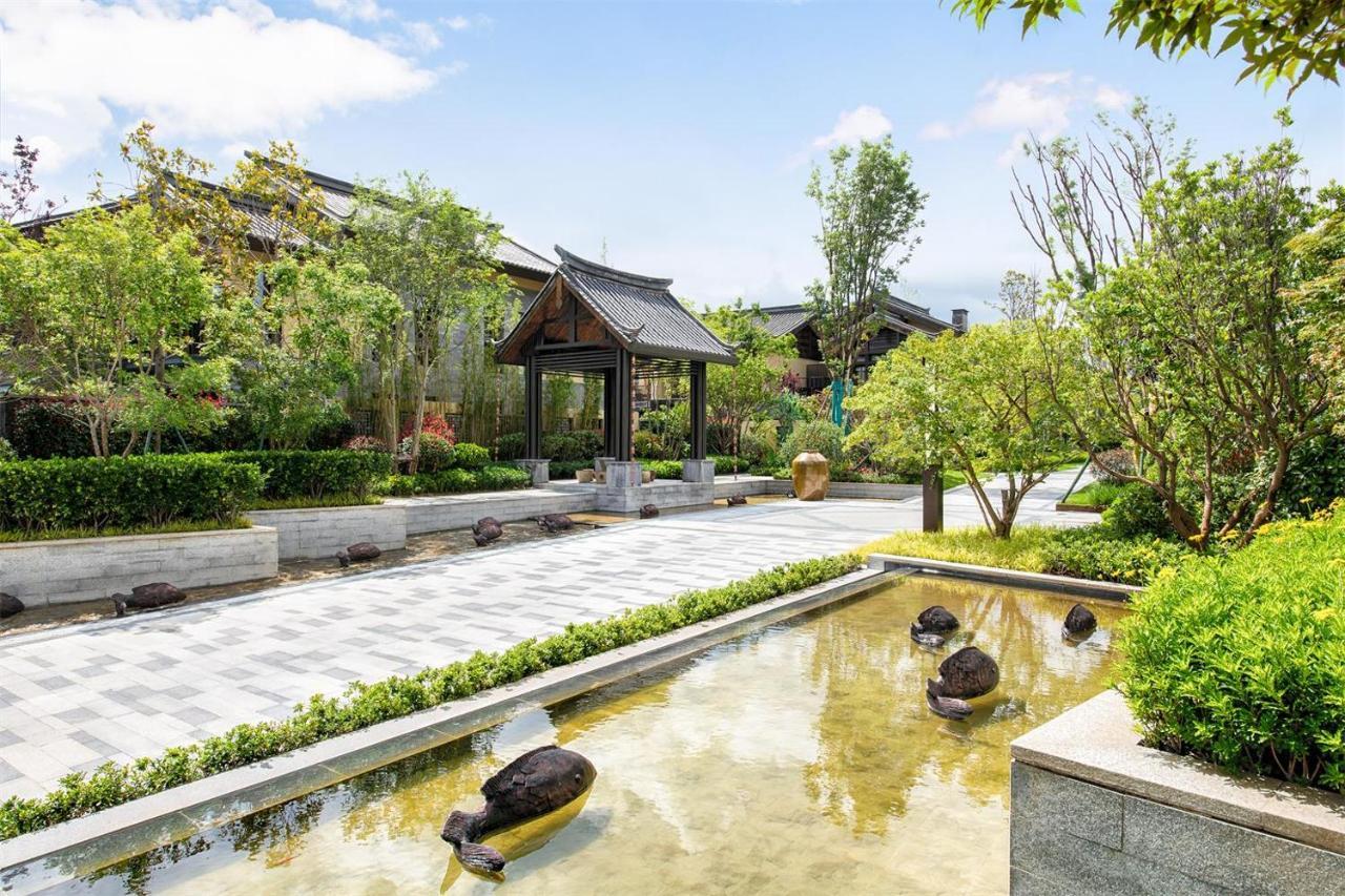ליג'יאנג Howard Johnson Jinlin Plaza Lijiang מראה חיצוני תמונה
